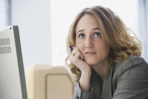 Bored Businesswoman Working in Office