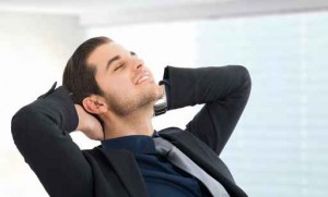 Relaxed businessman with closed eyes