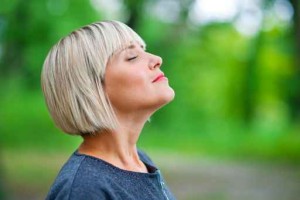 attractive woman breathing and relaxing