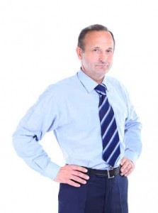 Portrait of an old businessman in suit isolated