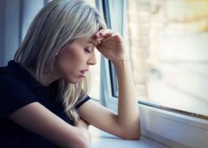 Young unhappy woman in depression